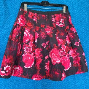 black mini skirt with red and pink flowers